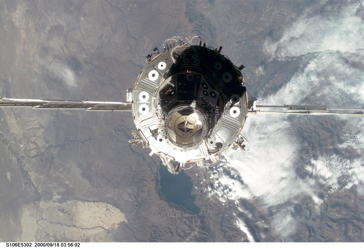 S106-E-5302 (18 September 2000) --- The International Space Station (ISS) is seen with the U.S.-built Unity node facing the camera, following its undocking with the Space Shuttle Atlantis. After accomplishing all mission objectives in outfitting the station for the first resident crew, the seven astronauts and cosmonauts undocked at 3:46 (GMT) on Sept. 18 over Russia near the northeastern portion of Ukraine. When Atlantis was at a safe distance from the station, about 450 feet, astronaut Scott D. Altman, pilot, performed a 90-minute, double-loop fly around to enable the crew to document the station’s exterior. He fired Atlantis’ jets one final time to separate from the station at 5:35 GMT, September 18.
