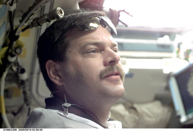 NASA image: Pilot Altman occupies the aft crew workstation during ISS undocking