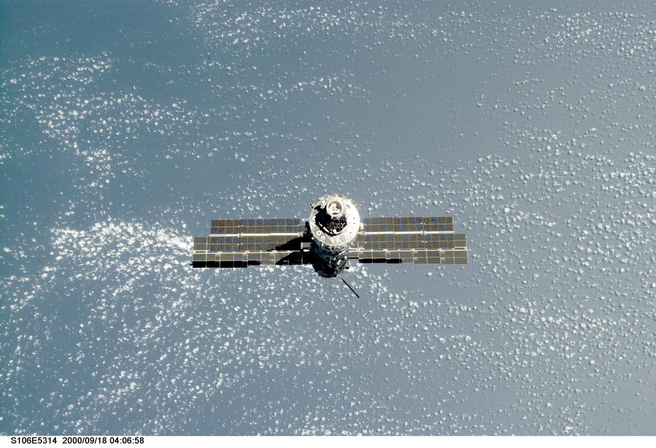 S106-E-5314 (18 September 2000) --- Backdropped against the blue and white Earth, the International Space Station (ISS) is seen following its undocking with the Space Shuttle Atlantis. After accomplishing all mission objectives in outfitting the station for the first resident crew, the seven astronauts and cosmonauts undocked at 3:46 (GMT) on Sept. 18 over Russia near the northeastern portion of the Ukraine. When Atlantis was at a safe distance from the station, about 450 feet, astronaut Scott D. Altman, pilot, performed a 90-minute, double-loop fly around to enable the crew to document the station’s exterior. He fired Atlantis’ jets one final time to separate from the station at 5:35 GMT, September 18.