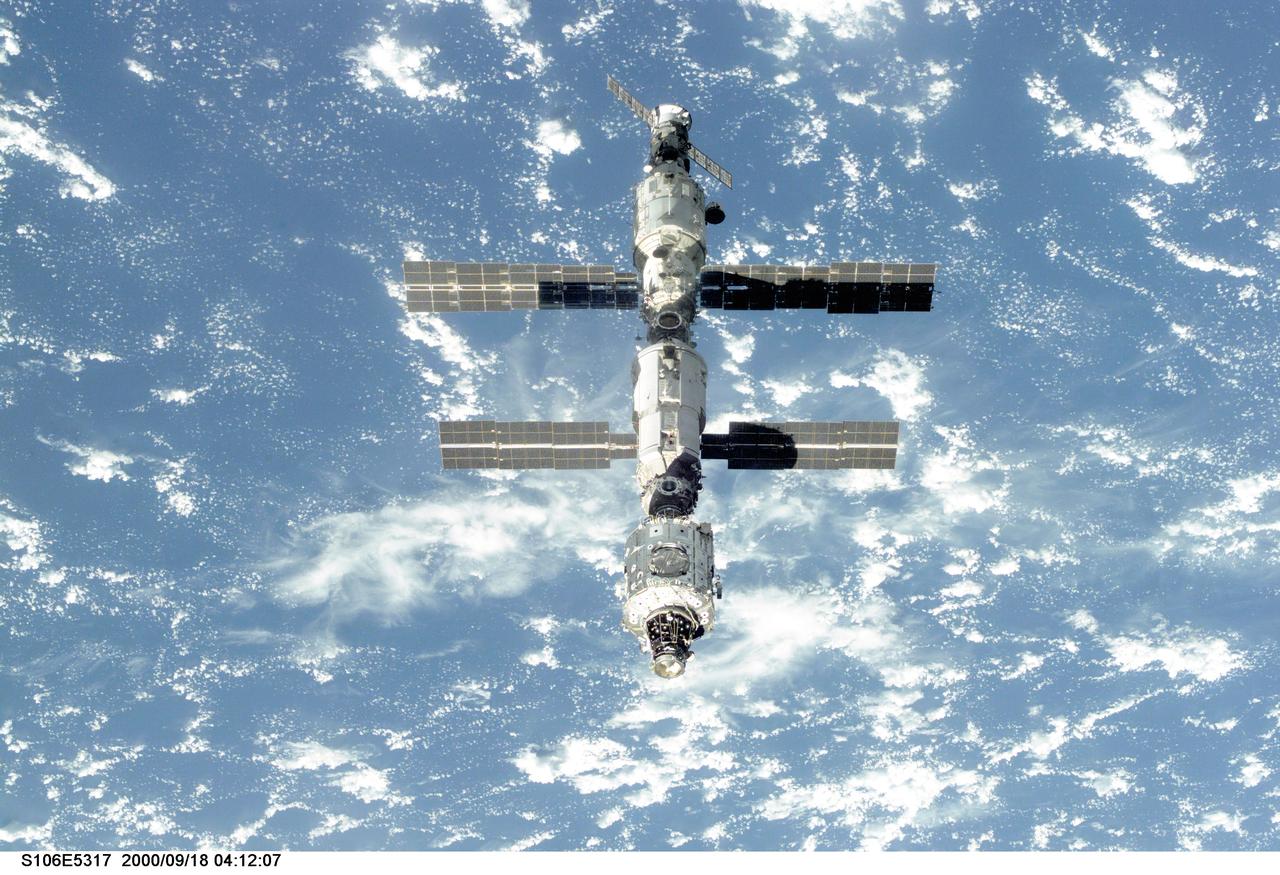 S106-E-5317 (18 September 2000) --- The International Space Station (ISS) is seen following its undocking with the Space Shuttle Atlantis. After accomplishing all mission objectives in outfitting the station for the first resident crew, the seven astronauts and cosmonauts undocked at 3:46 (GMT) on Sept. 18 over Russia near the northeastern portion of Ukraine. When Atlantis was at a safe distance from the station, about 450 feet, astronaut Scott D. Altman, pilot, performed a 90-minute, double-loop fly around to enable the crew to document the station’s exterior. He fired Atlantis’ jets one final time to separate from the station at 5:35 GMT, September 18.