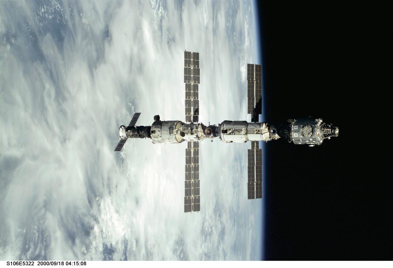 S106-E-5322 (18 September 2000) --- Backdropped against Earth's horizon, the International Space Station (ISS) is seen following its undocking with the Space Shuttle Atlantis. After accomplishing all mission objectives in outfitting the station for the first resident crew, the seven astronauts and cosmonauts undocked at 3:46 GMT on Sept. 18 over Russia near the northeastern portion of Ukraine. When Atlantis was at a safe distance from the station, about 450 feet, astronaut Scott D. Altman, pilot, performed a 90-minute, double-loop fly around to enable the crew to document the station’s exterior. He fired Atlantis’ jets one final time to separate from the station at 5:35 (GMT) September 18.