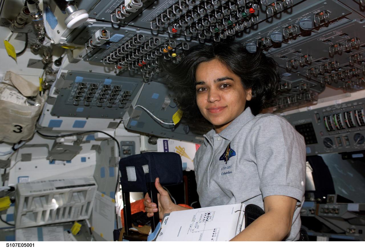 STS107-E-05001 (17 January 2003) --- Astronaut Kalpana Chawla, STS-107 mission specialist, is pictured on the flight deck of the Earth-orbiting Space Shuttle Columbia.