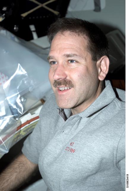 NASA image: STS-109 MS Grunsfeld on middeck