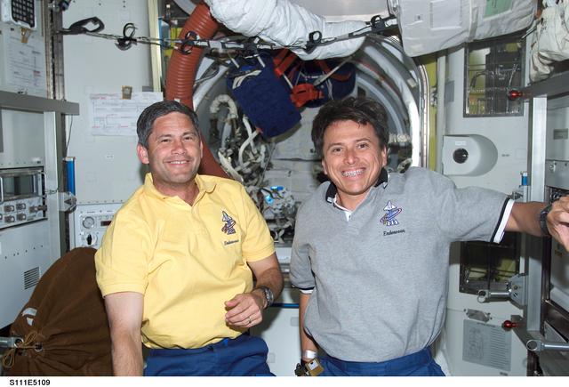 NASA image: Lockhart and Chang-Diaz pose in the Quest A/L during STS-111 UF-2 docked OPS