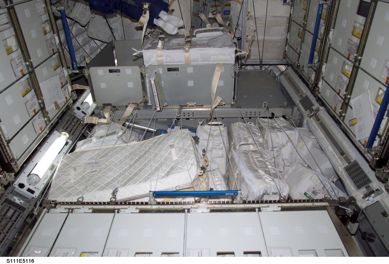 STS111-E-5116 (9 June 2002) --- One of the STS-111 crewmembers took this interior view of the Leonardo Multi-Purpose Logistics Module (MPLM). Leonardo was unberthed from the payload bay of the Space Shuttle Endeavour on June 8, 2002 by astronaut Kenneth D. Cockrell, STS-111 mission commander, operating the shuttle’s robotic arm to move the module to the International Space Station’s (ISS) Unity node. Leonardo’s installation was completed at 9:28 a.m. (CDT). Leonardo is one of three Multi-Purpose Logistics Modules built by the Italian Space Agency that serve as pressurized, reusable cargo carriers to ferry supplies, equipment and experiments between the ground and the space station.