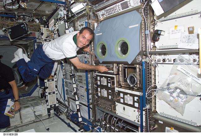 NASA image: Perrin floats next to the MSG in the Destiny U.S. Lab during STS-111 UF-2 docked OPS