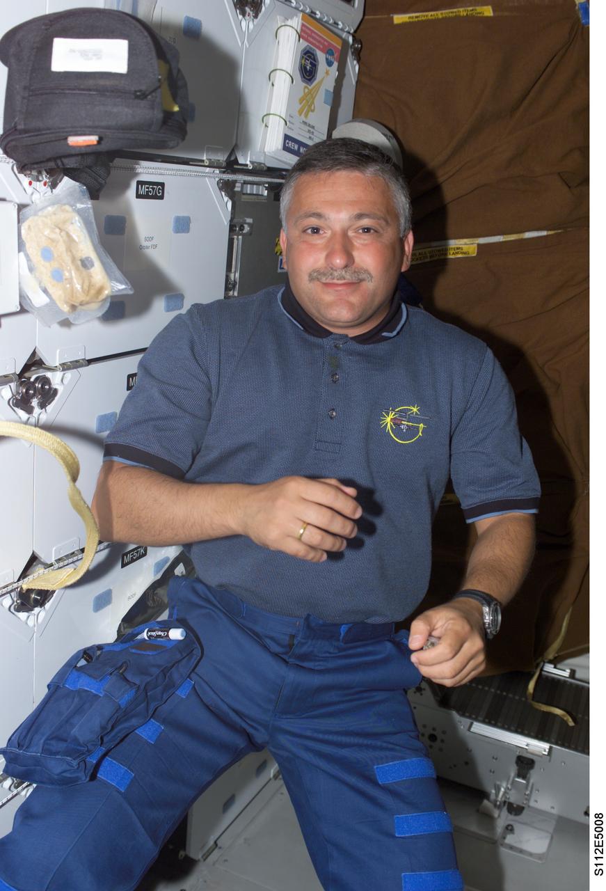 STS112-E-05008 (8 October 2002) --- Cosmonaut Fyodor N. Yurchikhin, STS-112 mission specialist representing Rosaviakosmos, is pictured on the middeck of the Space Shuttle Atlantis.