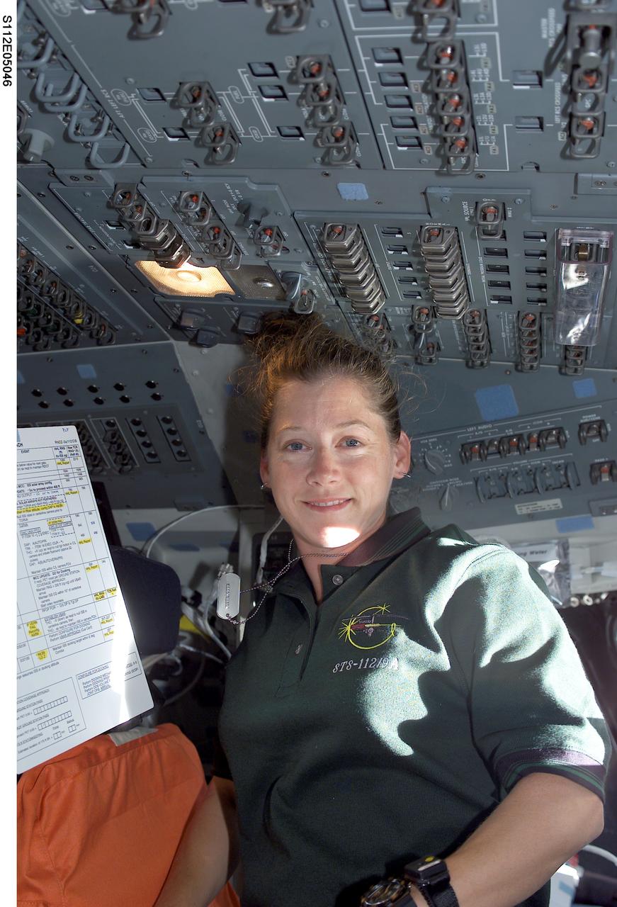 STS112-E-05046 (9 October 2002) --- Astronaut Pamela A. Melroy, STS-112 pilot, is pictured on the flight deck of the Space Shuttle Atlantis.