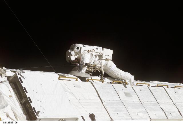 NASA image: EVA 1 - MS Sellers works on S1 truss