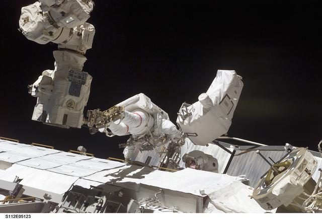 NASA image: EVA 1 - MS Wolf and Sellers on S1 truss