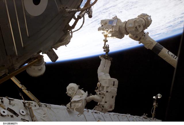 NASA image: MS Sellers on SSRMS during EVA 2