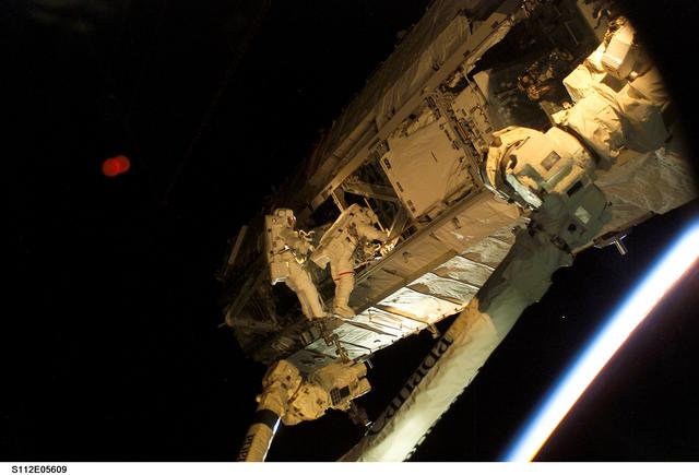NASA image: MS Sellers and Wolf on S1 truss during EVA 3