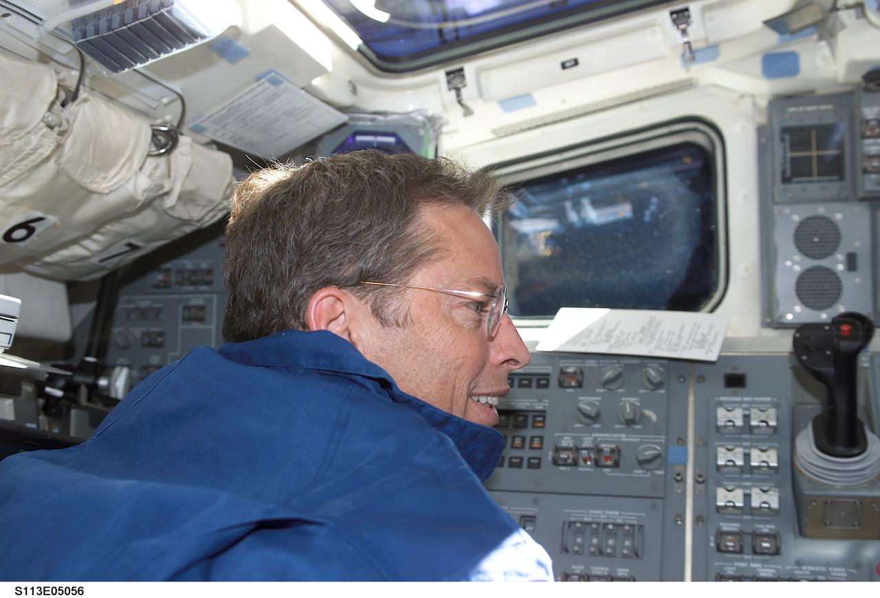 STS113-E-05056 (25 November 2002) --- Astronaut James D. Wetherbee, STS-113 mission commander, is pictured on the aft flight deck of the Space Shuttle Endeavour.