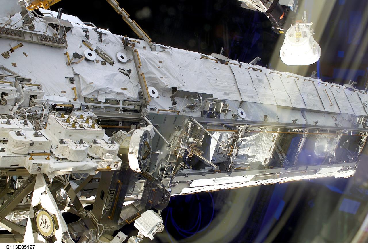 STS113-E-05127 (25 November 2002) --- The Starboard One (S1) Truss on the International Space Station (ISS) was photographed by a crewmember on board the Space Shuttle Endeavour during rendezvous and docking operations between the two spacecraft. Endeavour docked with the station at 3:59 p.m. (CST) on November 25, 2002.