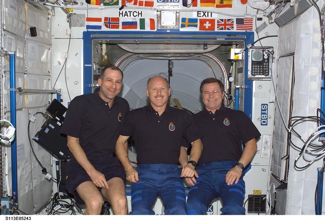 NASA image: Expedition Six Crewmembers In-flight Crew Portrait taken in the U.S. Laboratory during STS-113 (11A)