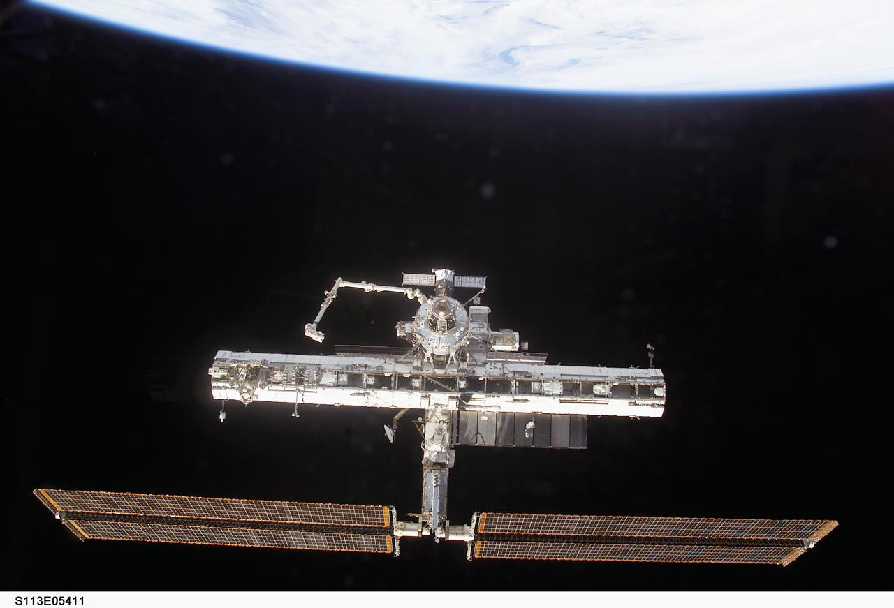 Forward view of the ISS taken during flyaround operations following STS-113 undocking