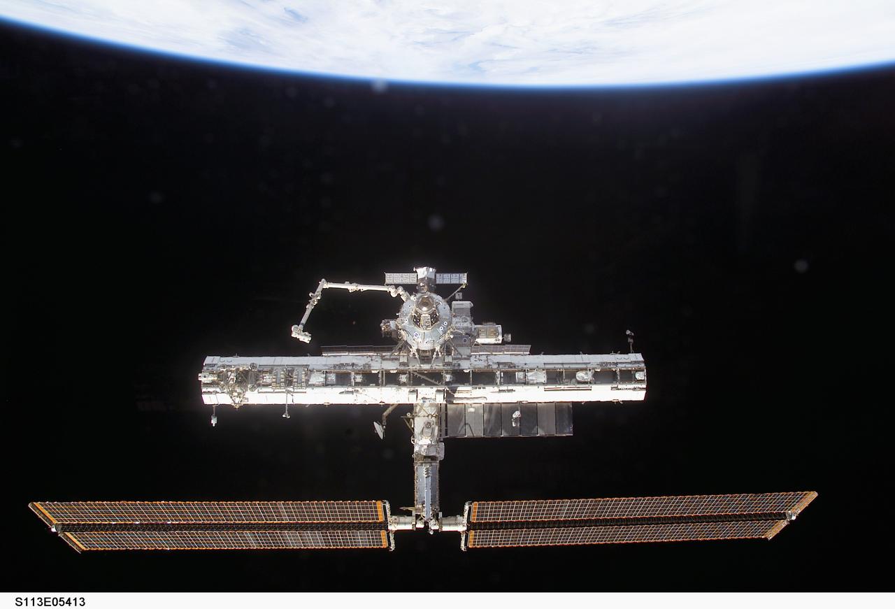 Forward view of the ISS taken during flyaround operations following STS-113 undocking