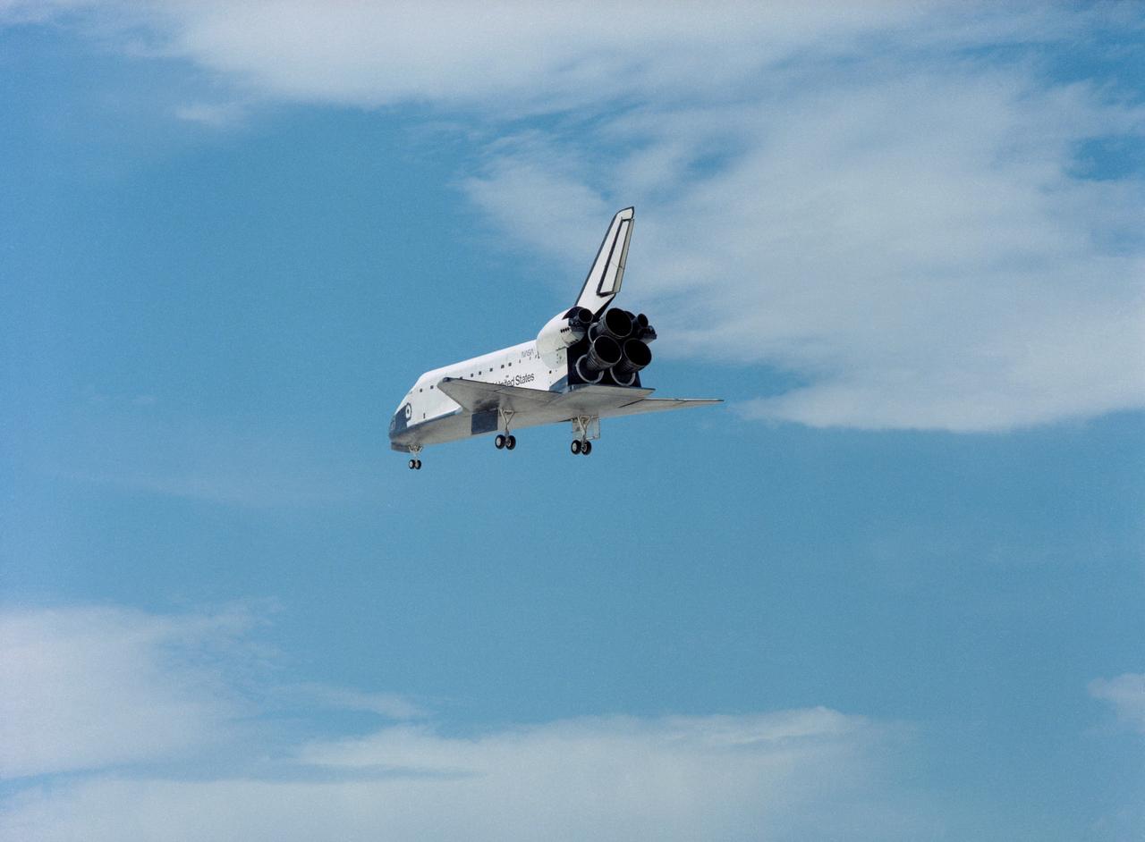 STS030-S-124 (8 May 1989) --- Its landing gear fully deployed, Space Shuttle Atlantis is lined up for its approach to Runway 22 at Edwards Air Force Base in southern California.  Minutes later, at 12:44:33 (PDT), the spacecraft's wheels had come to a complete stop, marking the successful conclusion for the four-day STS-30 mission. Onboard were astronauts David M. Walker, Ronald J. Grabe, Norman E. Thagard, Mary L. Cleave and Mark C. Lee.