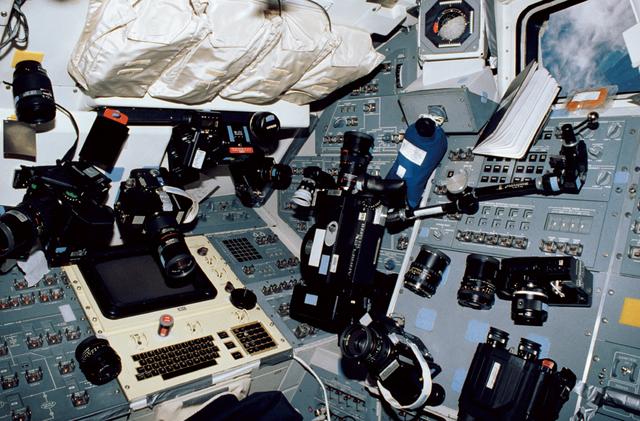 NASA image: STS-35 aft flight deck of Columbia, OV-102, with an array of camera equipment