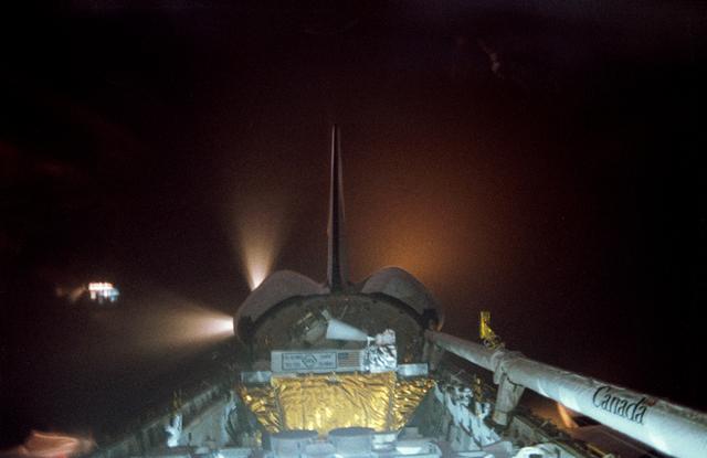NASA image: STS-39 OV-103 reaction control system (RCS) jets fire during onorbit maneuver