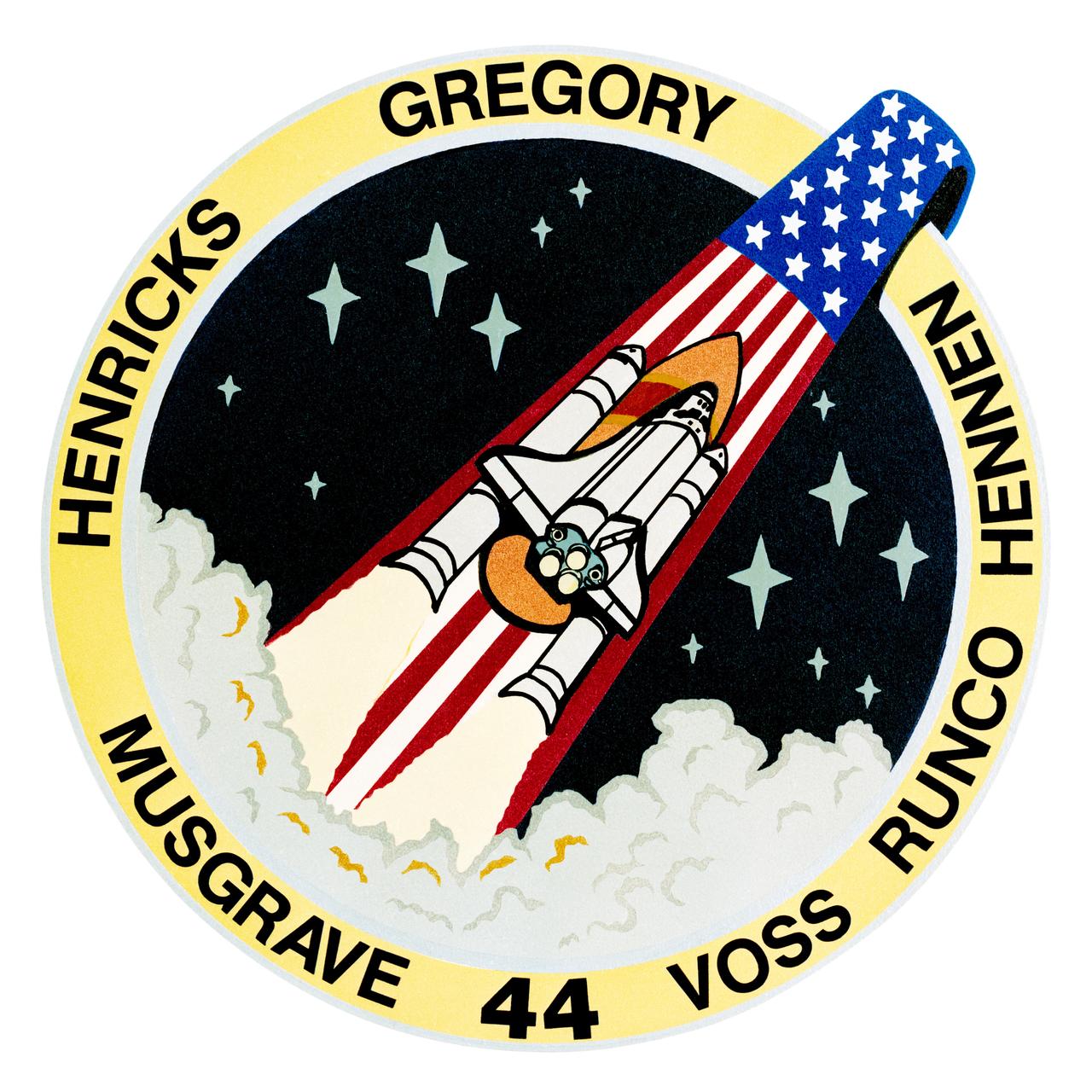 STS044-S-001 (July 1991) --- Designed by the participating crew members, the STS-44 patch shows the space shuttle Atlantis shortly after liftoff as it rolls to ascend into orbit. The orbital path illustrated by the red, white and blue of the stylized American flag represents the American contribution and strength derived from this mission. The black background of space, indicative of the mysteries of the universe, is illuminated by six large stars, which depict the American crew of six and the hopes that travel with them. The smaller stars represent the myriad of unheralded Americans who work in support of this mission. Within the shuttle's payload bay is a Defense Support Program (DSP) Satellite which will help insure peace. The stars of the flag symbolize our leadership in an exciting quest of space and the boundless dreams for mankind's future.  In the words of a crew spokesman, "the stars of the flag symbolize our leadership in an exciting quest of space and the boundless dreams for humanity's future." The NASA insignia design for space shuttle flights is reserved for use by the astronauts and for other official use as the NASA Administrator may authorize. Public availability has been approved only in the forms of illustrations by the various news media. When and if there is any change in this policy, which is not anticipated, the change will be publicly announced. Photo credit: NASA