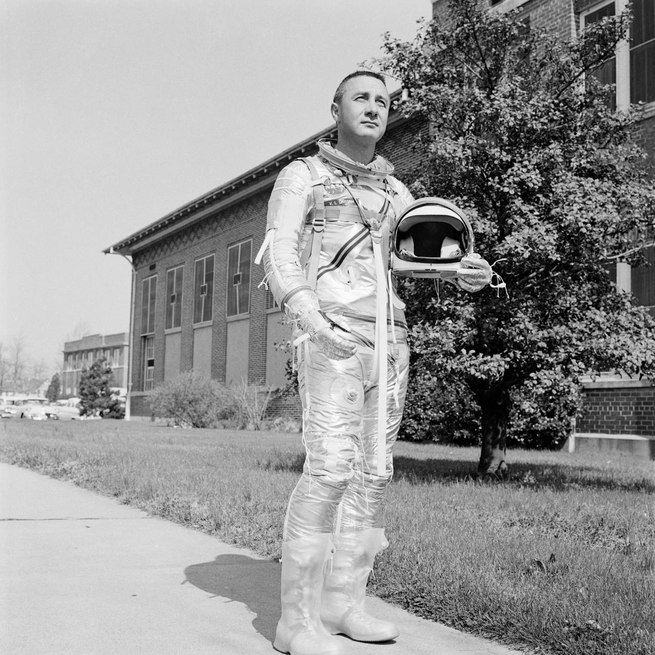S61-01490 (4 April 1961) --- Astronaut Virgil Grissom photographed in the new Mercury spacesuit, holding his helmet. Photo credit: NASA
