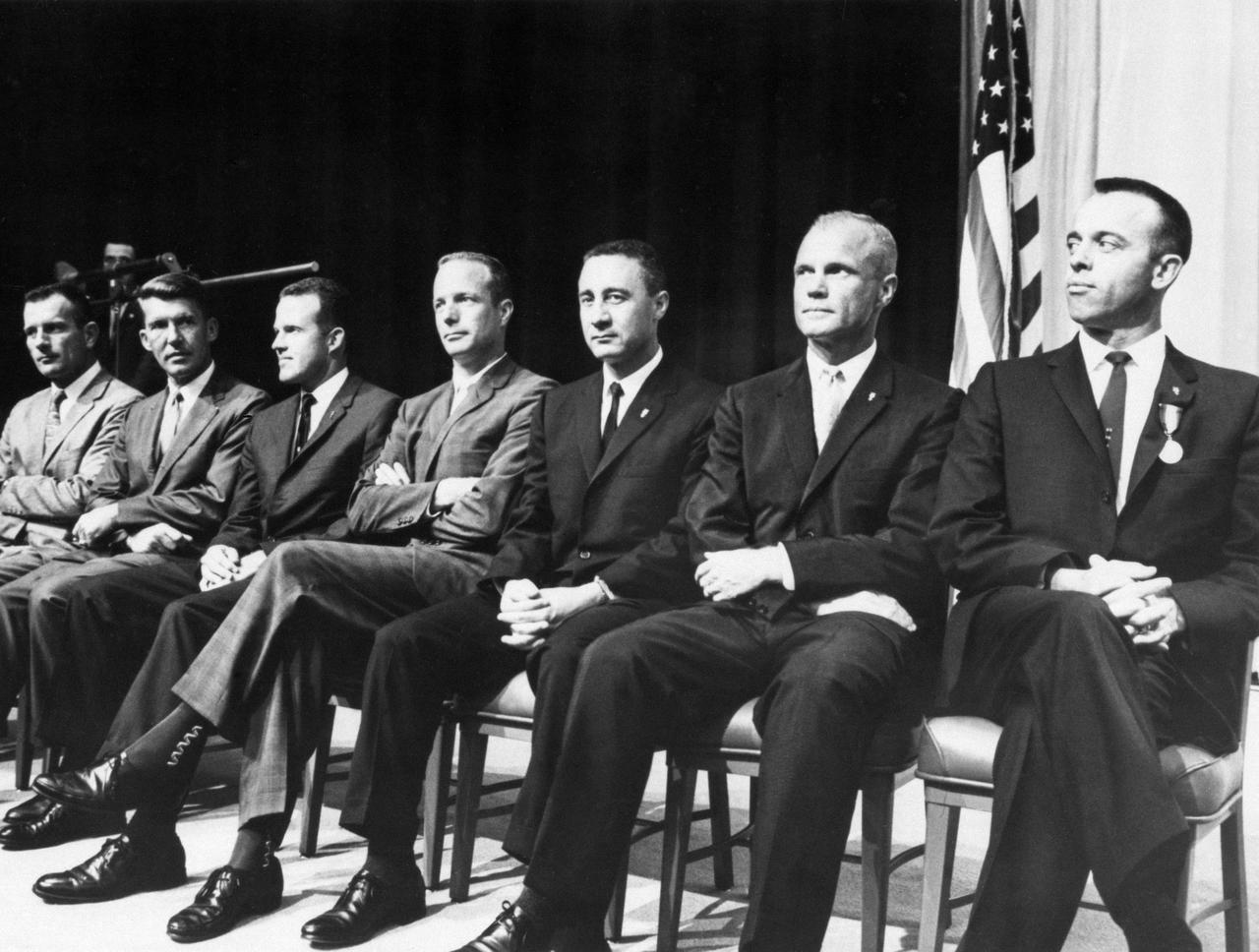 S61-02357 (8 May 1961) --- The original seven Mercury astronauts at the State Department Auditorium on May 8, 1961.  The astronauts are (left to right) Donald K. Slayton, Walter M. Schirra, Jr., L. Gordon Cooper, Jr., M. Scott Carpenter, Virgil I. Grissom, John H. Glenn, Jr. and Alan B. Shepard, Jr.  Earlier President John F. Kennedy had presented astronaut Shepard with the NASA Distinguished Service Medal (note it on his lapel) in the White House Rose Garden.