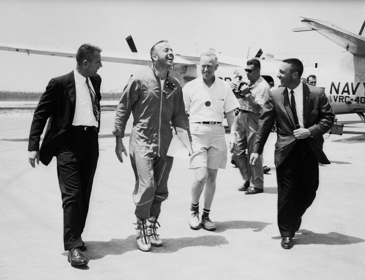 S61-02385 (5 July 1961) --- Astronaut Alan B. Shepard Jr. arrives at Grand Bahamas Island and is greeted by astronauts Virgil I. (Gus) Grissom (right) and Donald Slayton (left) and also by Keith Lindell (between Shepard and Grissom) after the first American suborbital flight. He will participate in a press conference with Grissom and Slayton. Photo credit: NASA or National Aeronautics and Space Administration