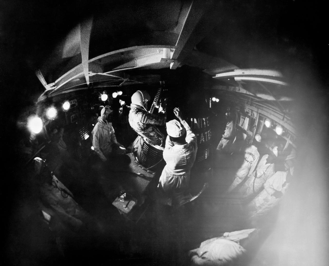 S62-00955 (February 1962) --- This is a view of John H. Glenn Jr. ingressing the Mercury-Atlas 6 spacecraft. Photo credit: NASA