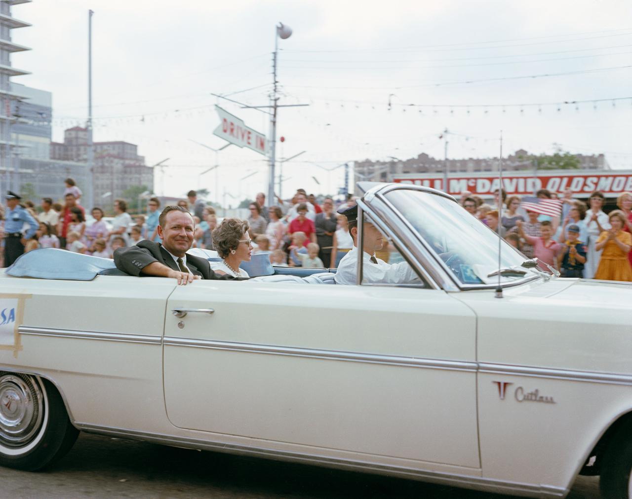 S63-07945 (23 May 1963) --- Flight Director Christopher C. Kraft Jr. rides in a Houston parade celebrating the successful completion of the final Mercury mission ? the MA-9 flight of astronaut Gordon Cooper. Photo credit: NASA