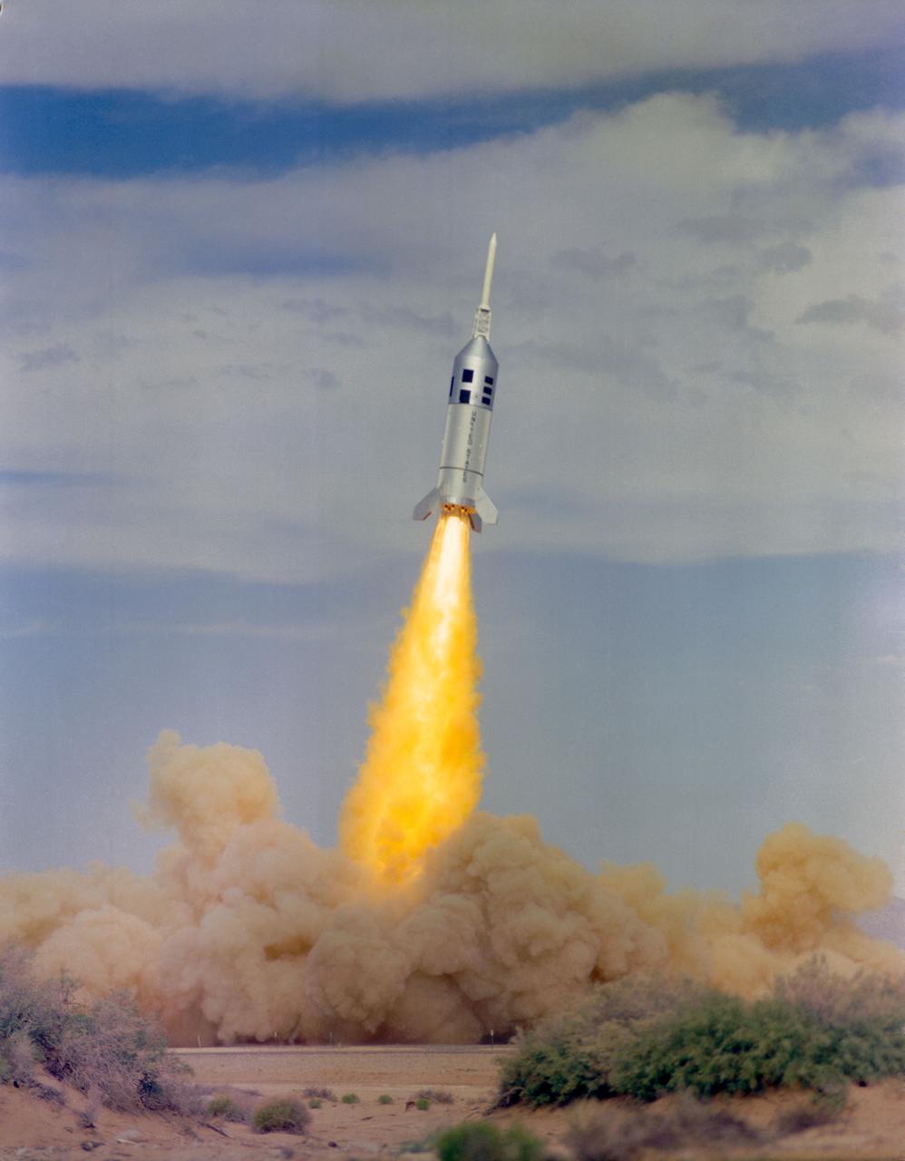 S63-15701 (28 August 1963) --- All seven motors of Little Joe II, ignited simultaneously at launch, with a total thrust of about 310,000 pounds.  A maximum height of 24,000 feet was attained as Little Joe II traveled 47,000 feet north on the White Sands Test Range.