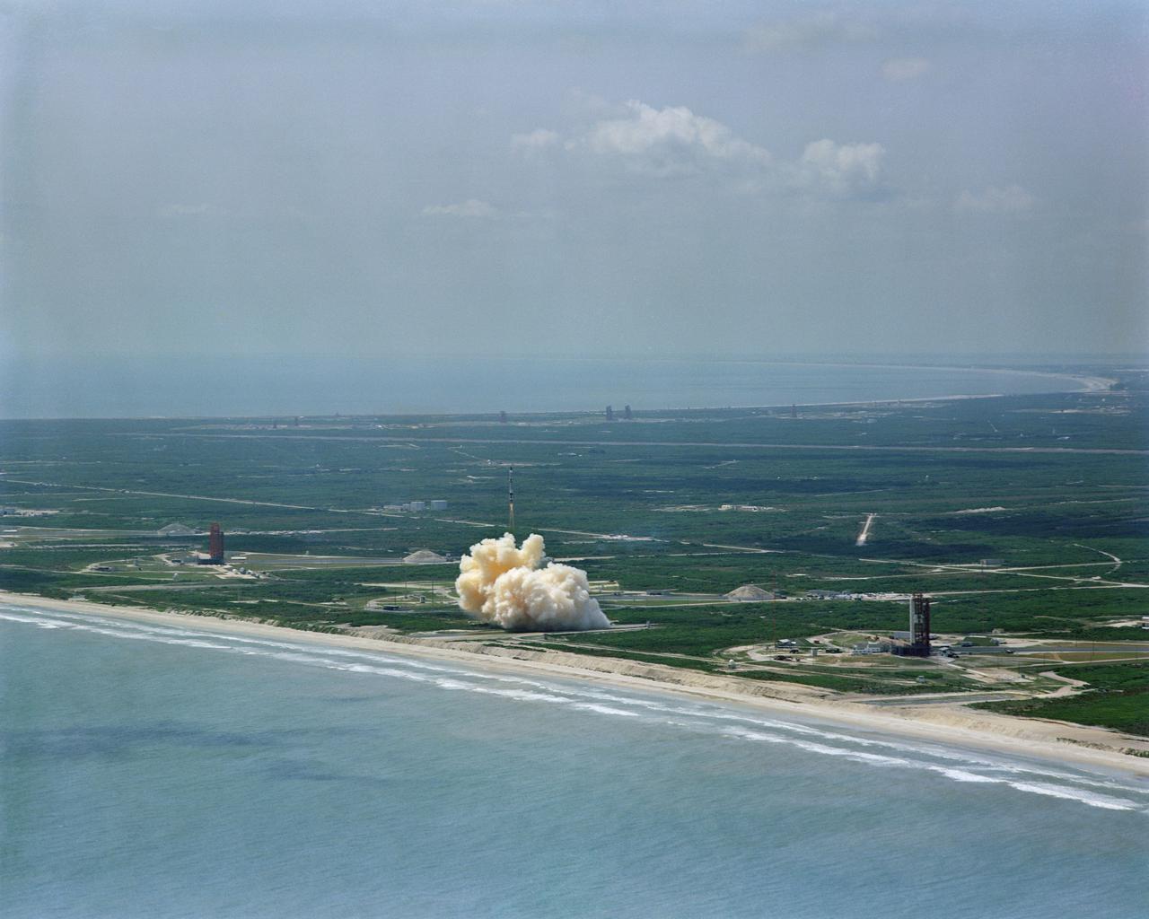 S64-22412 (8 April 1964) --- Aerial view of the Gemini/Titan-II launch vehicle #1 liftoff at Cape Kennedy, Florida.