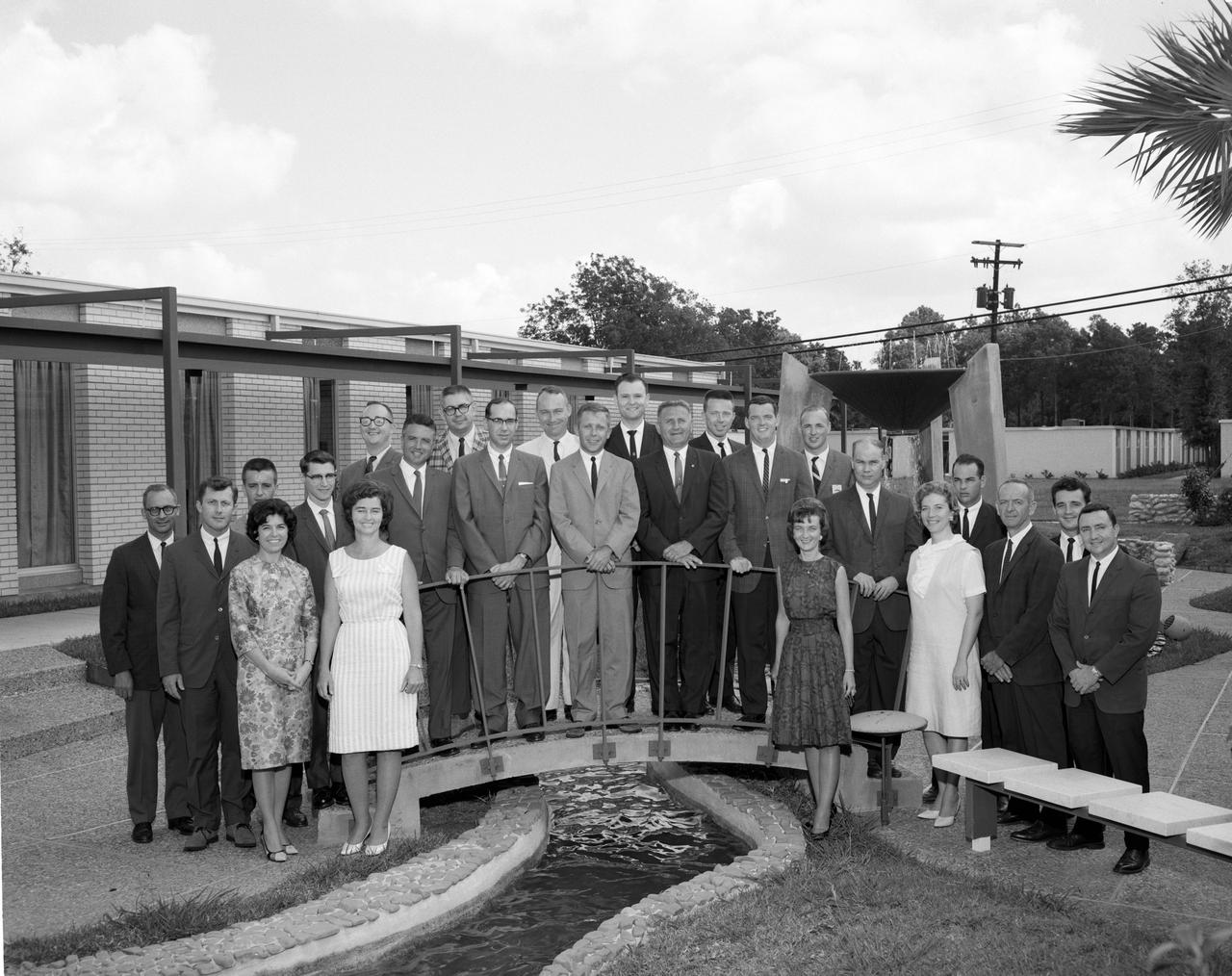 Group shot of the nucleus of the 1960 Flight Operations Division for the Mercury Program. Image taken at the Houston Petroleum Center (HPC) in Houston, TX, prior to their move to the Manned Spacecraft Center (MSC). This photo was published in the Space News Roundup, 07/08/1964. The women are (L-R): Doris Folkes, Cathy Osgood, Shirley Hunt and Mary Shep Burton. The men are (L-R): Dick Koos, Paul Brumberg, John O'Loughlin, Emil Schiesser, Jim Dalby, Morris Jenkins, Carl Huss, John Mayer, Bill Tindall, Hal Beck, Charlie Allen, Ted Skopinski, Jack Hartung, Glynn Lunney, John Shoosmith, Bill Reini, Lyn Dunseith, Jerry Engel, Harold Miller and Clay Hicks. ( 26644 ); Houston, TX