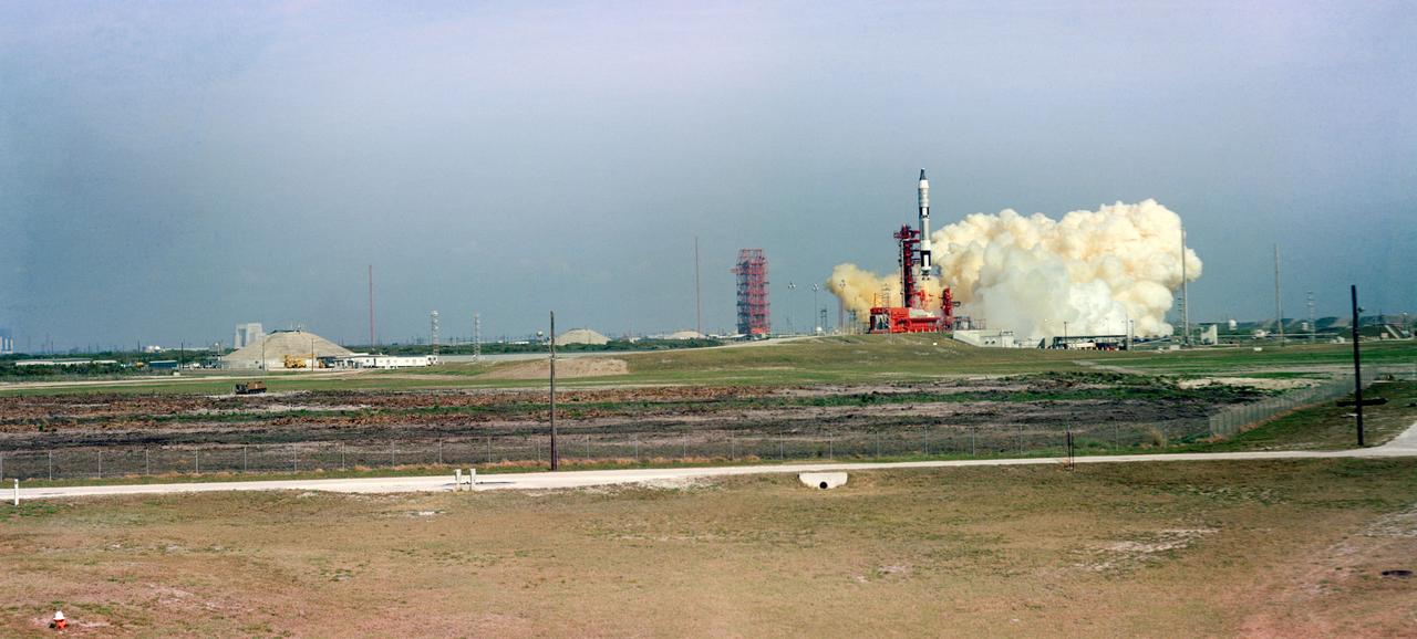 S65-21520 (23 March 1965) --- Distant view showing the successful launching of the first manned Gemini flight. The Gemini-Titan 3 (GT-3) lifted off Pad 19, at the Kennedy Space Center (KSC) at 9:24 a.m. (EST), March 23, 1965. The Gemini-3 spacecraft "Molly Brown" carried astronauts Virgil I. Grissom, command pilot, and John W. Young, pilot, on three successful orbits of Earth.