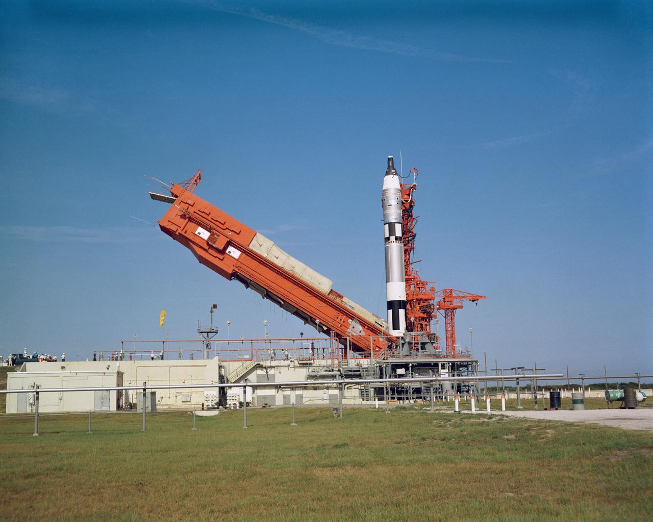 S65-49568 (21 Aug. 1965) --- The erector at Pad 19 is lowered in preparation for the launch of the Gemini-5 spacecraft. Astronauts L. Gordon Cooper Jr., command pilot; and Charles Conrad Jr., pilot, are crew members for the planned eight-day mission in space.