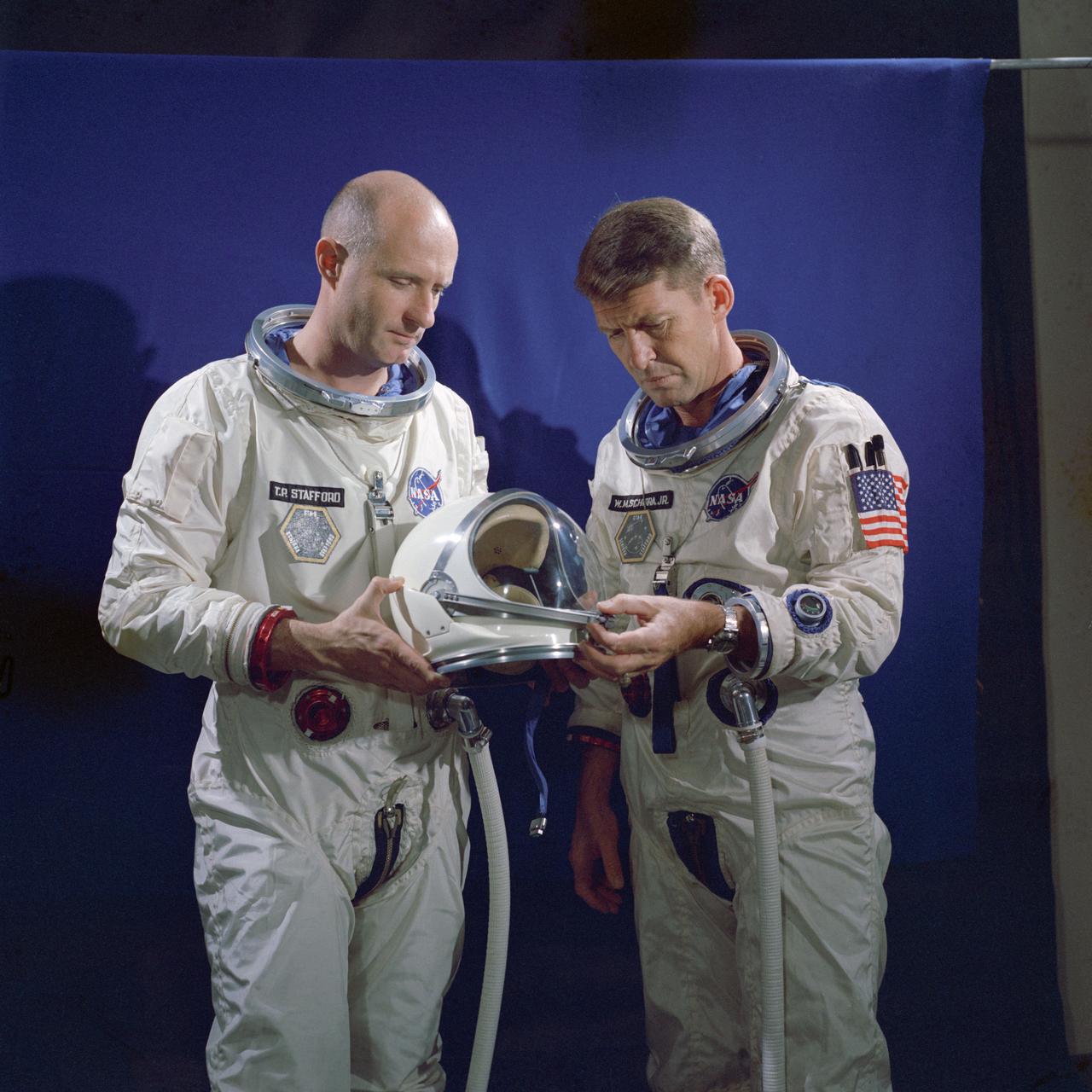 S65-56123 (1 Oct. 1965) --- Astronauts Thomas P. Stafford (left), pilot; and Walter M. Schirra Jr., command pilot, the prime crew of the Gemini-6 spaceflight, are pictured during a suiting up training exercise at Cape Kennedy, Florida. Photo credit: NASA or National Aeronautics and Space Administration
