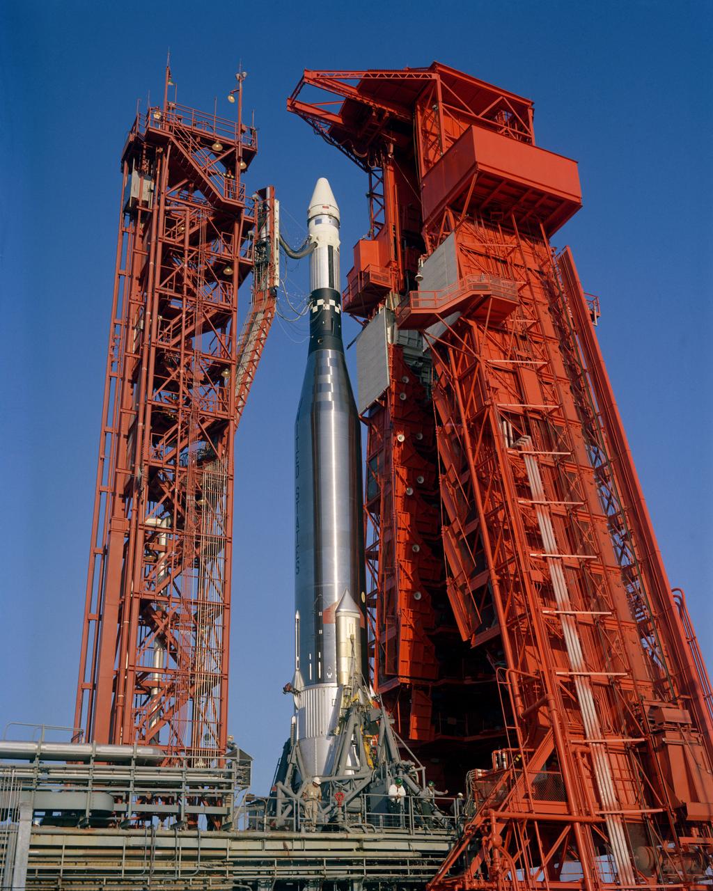 S65-57967 (25 Oct. 1965) --- View at Pad 14 during prelaunch operations for the Atlas/Agena. The Agena is mounted atop its Atlas launch vehicle. The Atlas/Agena liftoff was at 10 a.m. (EST) on Oct. 25, 1965. Intended as a rendezvous target vehicle in the Gemini-6 mission, the Agena failed to achieve orbit, and the Oct. 25 Gemini-6 launch was scrubbed. Photo credit: NASA or National Aeronautics and Space Administration