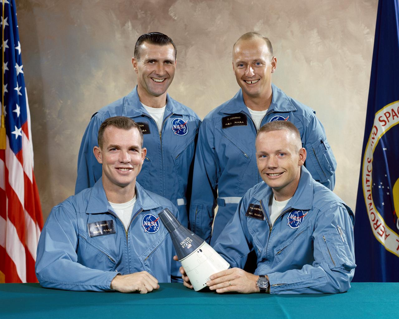 S65-58502 (4 Nov. 1965) --- This is the portrait of the prime and backup crew members of the Gemini-Titan 8 (GT-8) mission. Astronauts David R. Scott (left), pilot; and astronaut Neil A. Armstrong, command pilot, are the prime crew of the Gemini-8 mission. Backup crew (left to right, standing) are astronauts Richard F. Gordon Jr., pilot; and Charles Conrad Jr., command pilot. Photo credit: NASA