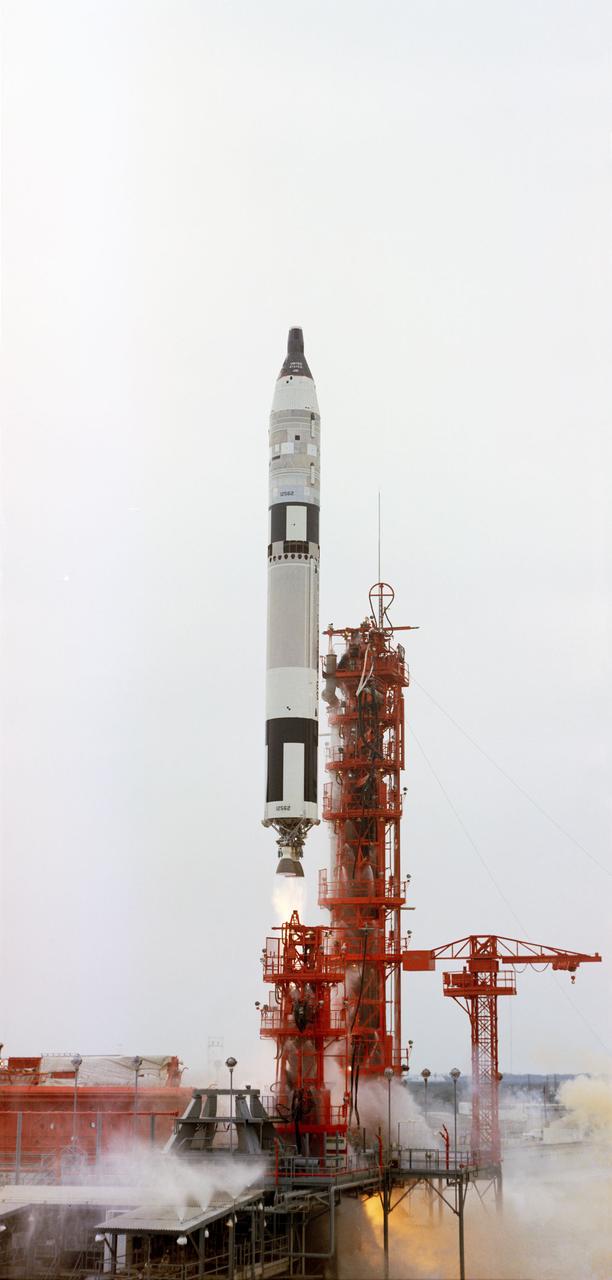 S65-61628 (4 Dec. 1965) --- Gemini-7, carrying astronauts Frank Borman, command pilot, and James A. Lovell Jr., pilot, was successfully launched from Pad 19 at 2:30 p.m., (EST) Dec. 4, 1965. Photo credit: NASA