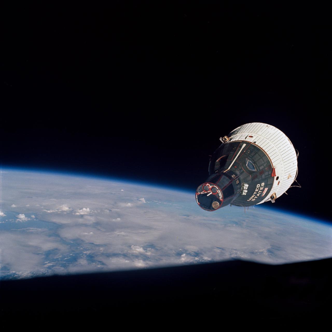 S65-63188 (15 Dec. 1965) --- The National Aeronautics and Space Administration's (NASA) Gemini-7 spacecraft as seen from the Gemini-6 spacecraft during their rendezvous mission in space. The two spacecraft are approximately 43 feet apart. The image was taken with a modified 70mm Hasselblad camera, using Eastman Kodak, Ektachrome (S.O. 217) color film. Photo credit: NASA or National Aeronautics and Space Administration