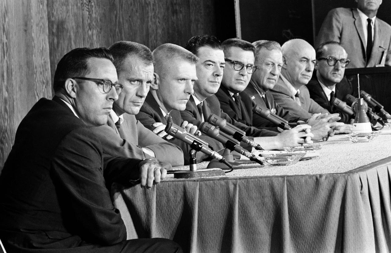 S66-32629 (1966) --- Left to right are Dr. Charles A. Berry, MSC Medical Director; Dr. Donald K. (Deke) Slayton, Director of Flight Crew Operations; Eugene F. Kranz, Flight Director; Charles W. Mathews, Gemini Program Manager, Manned Spacecraft Center; William C. Schneider, Gemini Mission Manager, NASA Headquarters; General Leighton Davis; Dr. Robert R. Gilruth, MSC Director; and Dr. George E. Mueller, Associate Administrator for Manned Space Flight, NASA Headquarters.