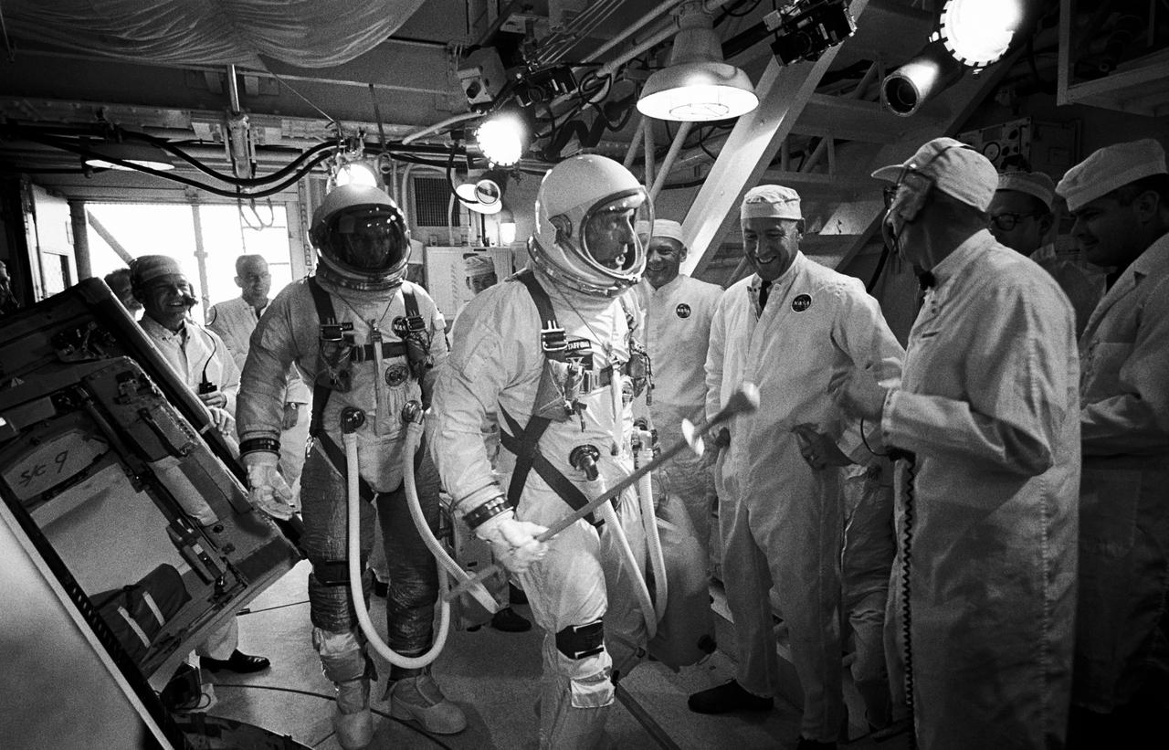 S66-34051 (3 June 1966) --- Astronauts Thomas P. Stafford and Eugene A. Cernan arrive in the White Room atop Pad 19 at the Kennedy Space Center in preparation for the launch of the Gemini-9 spaceflight. Photo credit: NASA