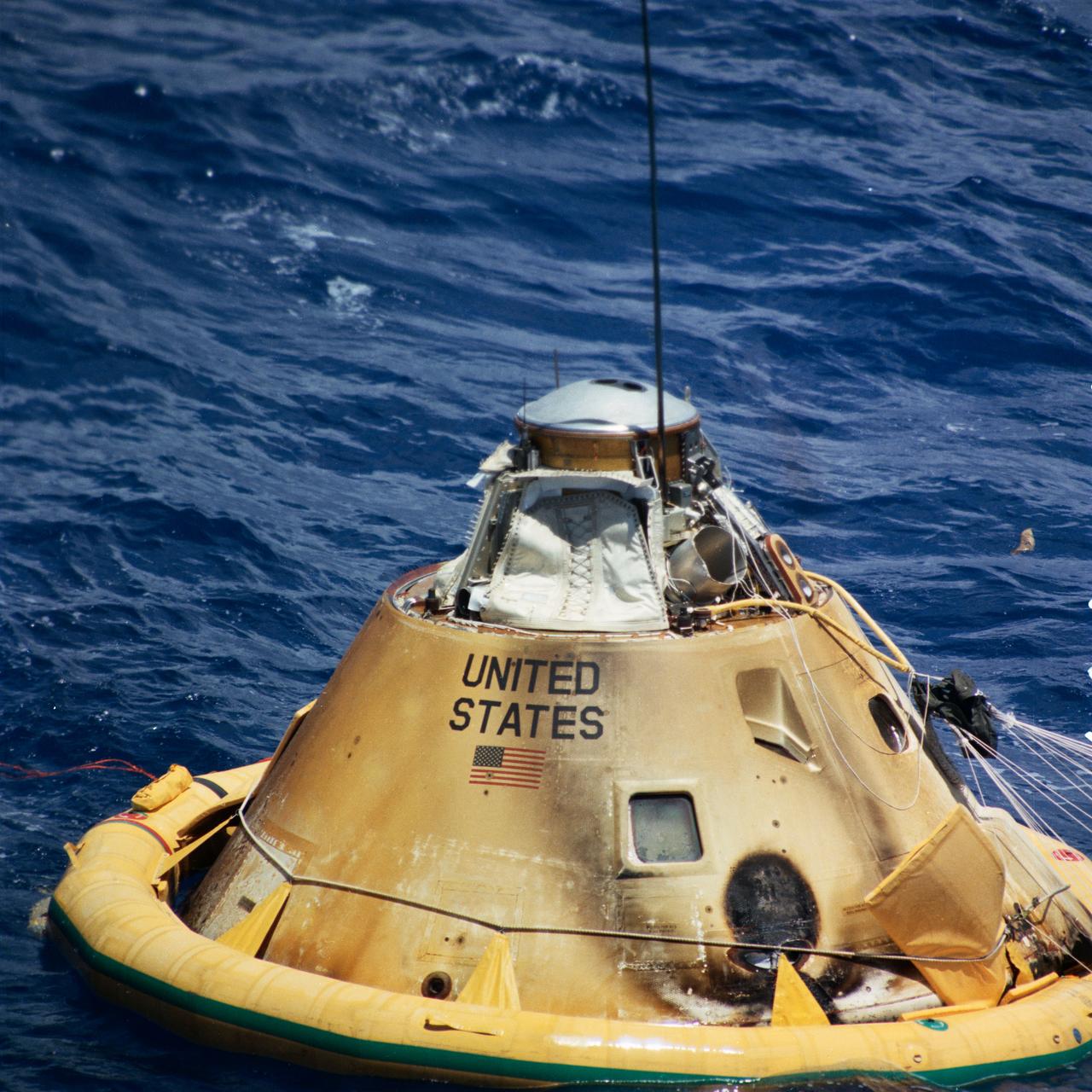 A/S 202 Command Module (C/M) attached to flotation collar.     RECOVERY AREA, CENTRAL PACIFIC OCEAN