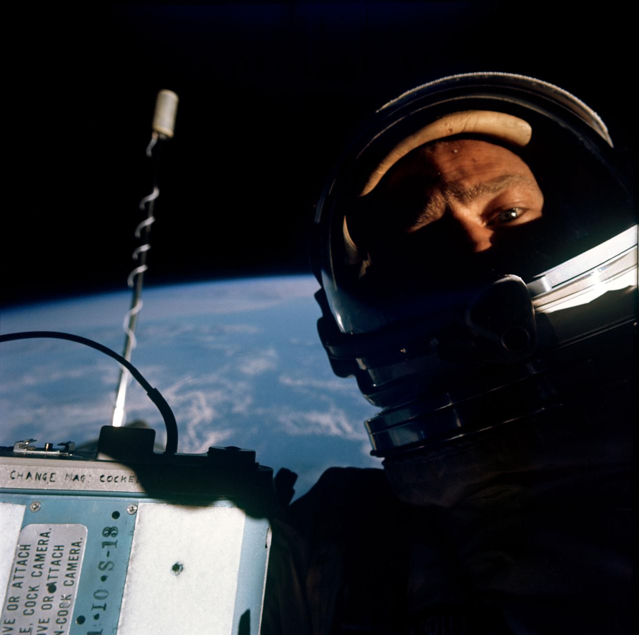 S66-62926 (12 Nov. 1966) --- Astronaut Edwin E. Aldrin Jr., pilot of the Gemini-12 spaceflight, is photographed with pilot's hatch of the spacecraft open. Note: J.A. Maurer camera which was used to photograph some of his extravehicular activity (EVA). Astronaut James A. Lovell Jr. was the command pilot. Photo credit: NASA