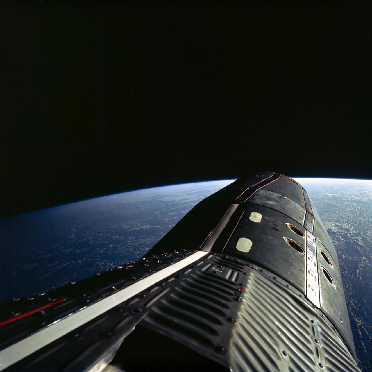 S66-63011 (13 Nov. 1966) --- Astronaut Edwin E. Aldrin Jr., pilot of the Gemini-12 spaceflight, took this picture of the Gemini-12 spacecraft during standup extravehicular activity (EVA) with the hatch open. Photo credit: NASA