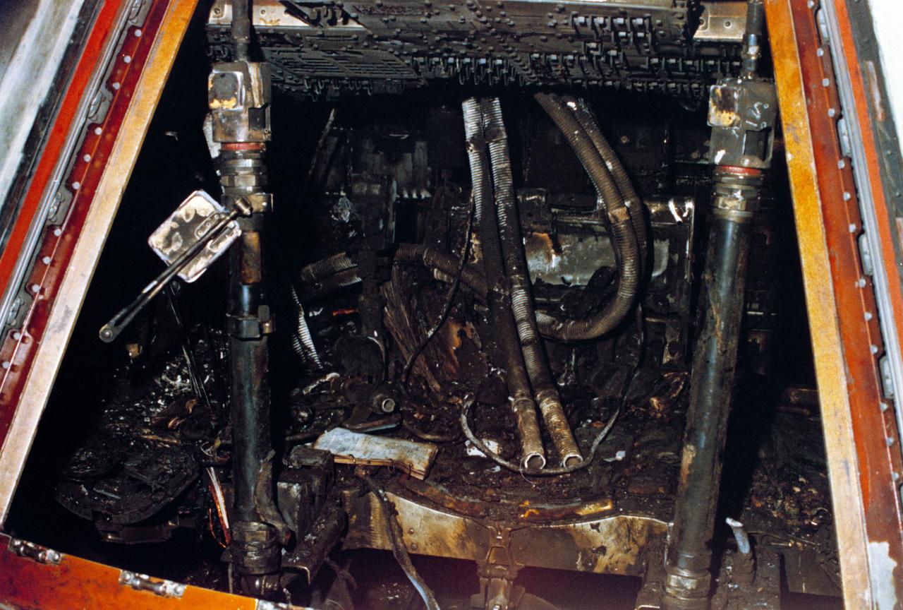 S67-21294 (28 Jan. 1967) --- Close-up view of the interior of Apollo Spacecraft 012 Command Module at Pad 34 showing the effects of the intense heat of the flash fire which killed the prime crew of the Apollo/Saturn 204 mission. Astronauts Virgil I. Grissom, Edward H. White II, and Roger B. Chaffee lost their lives in the accidental fire.