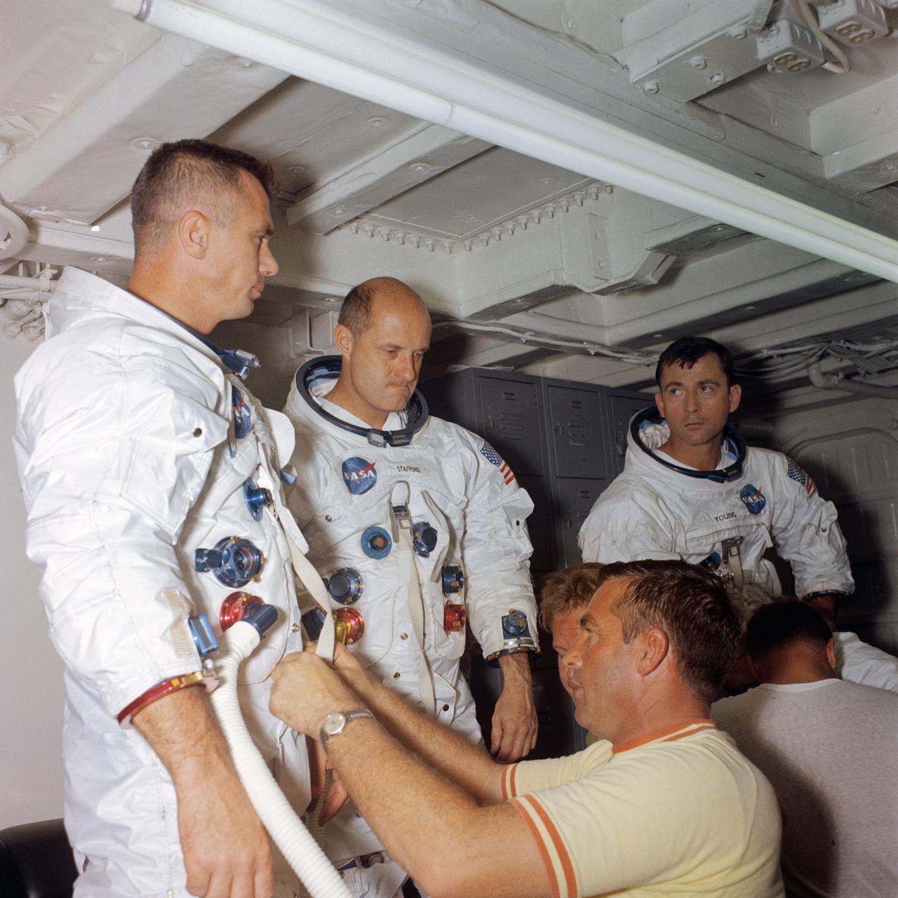S68-42908 (13 Nov. 1968) --- The prime crew members for the Apollo 10 mission are about to participate in water egress training in the Gulf of Mexico. Below deck on the NASA retriever vessel, from the left, are astronauts Eugene A. Cernan, lunar module pilot; Thomas P. Stafford, commander; and John W. Young, command module pilot.