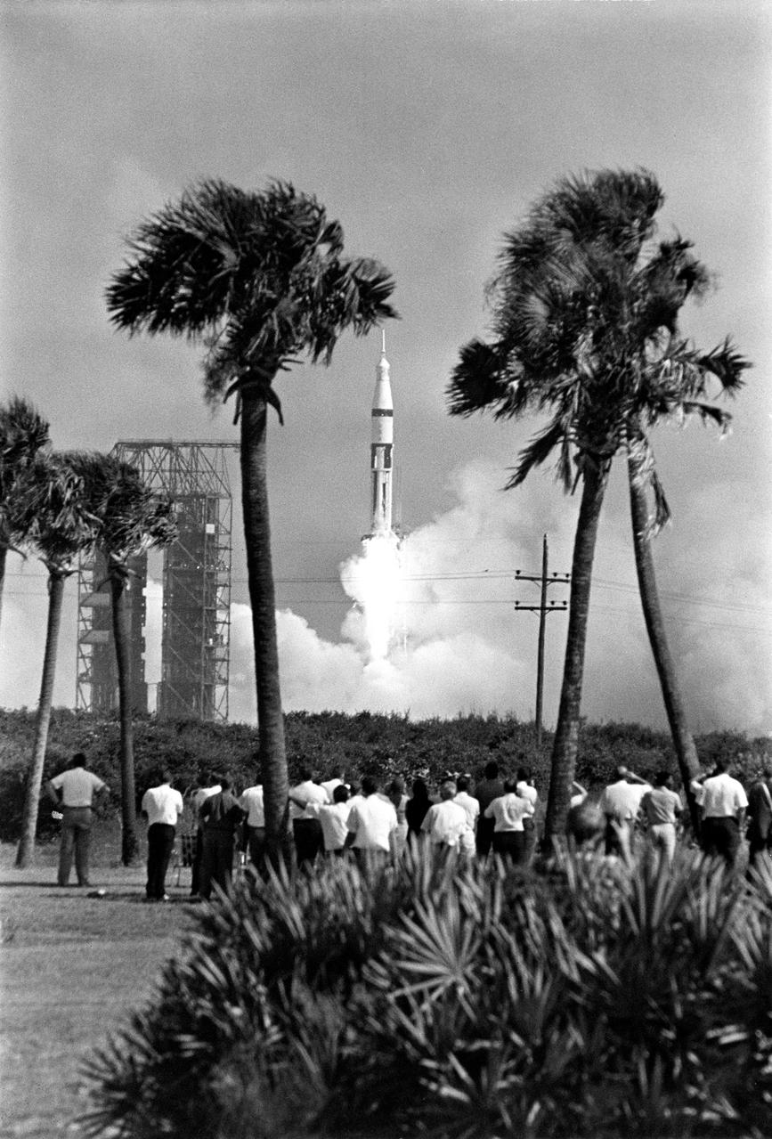 S68-48662 (11 Oct. 1968) --- The Apollo 7/Saturn IB space vehicle is launched from the Kennedy Space Center's Launch Complex 34 at 11:03 a.m. (EDT), Oct. 11, 1968. Apollo 7 (Spacecraft 101/Saturn 205) is the first of several manned flights aimed at qualifying the spacecraft for the half-million mile round trip to the moon. Aboard the Apollo spacecraft are astronauts Walter M. Schirra Jr., commander; Donn F. Eisele, command module pilot; and Walter Cunningham, lunar module pilot. (This view is framed by palm trees on either side).