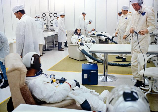 Apollo 7 prime crew goes through suiting up operations prior to launch