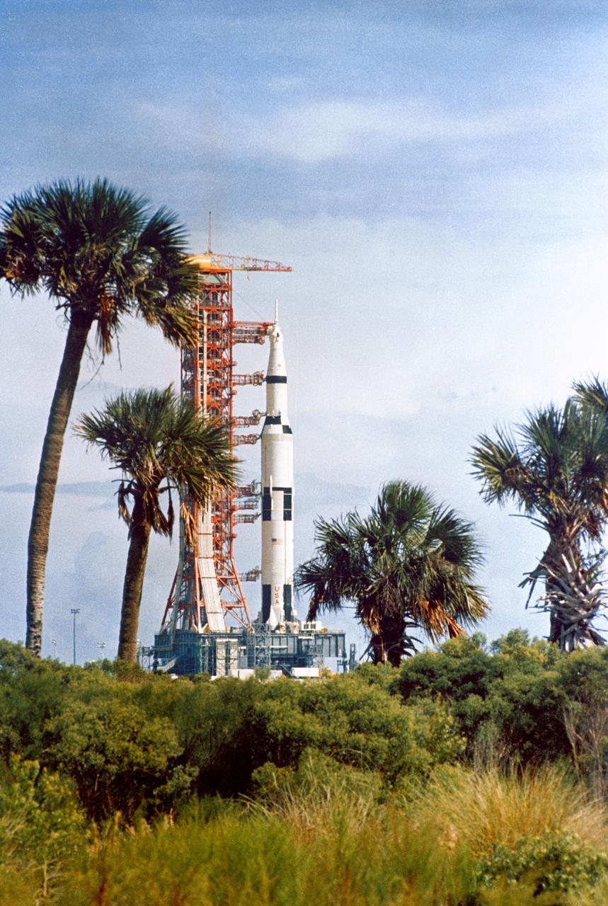 S68-49399 (9 Oct. 1968) --- The Apollo 8 (Spacecraft 103/Saturn 503) space vehicle on the way from the Kennedy Space Center's (KSC) Vehicle Assembly Building (VAB) to Pad A, Launch Complex 39. The Saturn V stack and its mobile launch tower are atop a huge crawler-transporter.